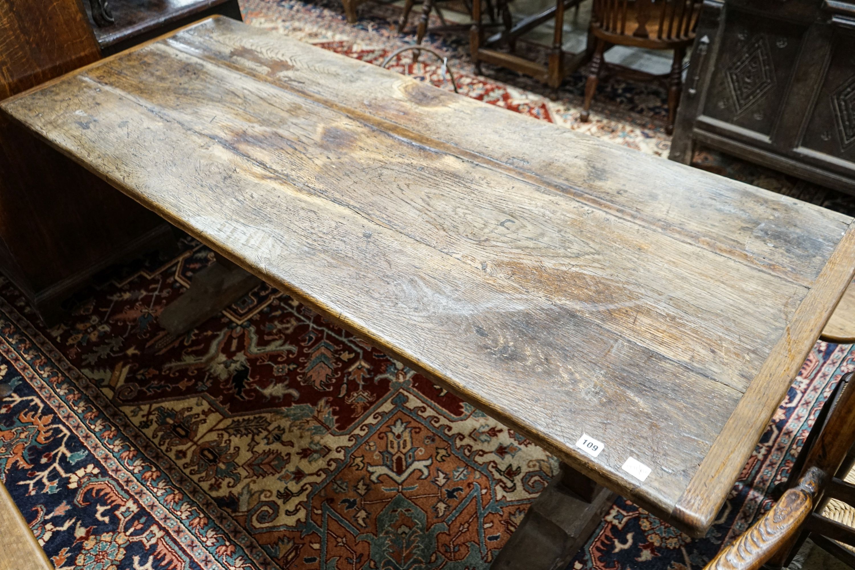 A 17th century style oak refectory table, width 191cm, depth 74cm, height 73cm